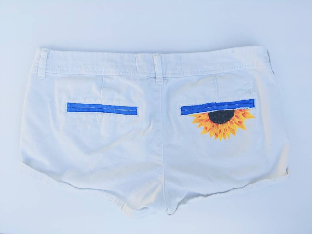 Sunflower and Blue Skys - Low Rise White Shorts with Hand Painted Pockets