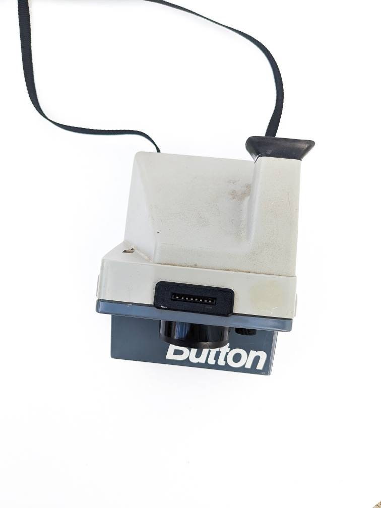 The Button - Vintage 1970s Polaroid Land Camera